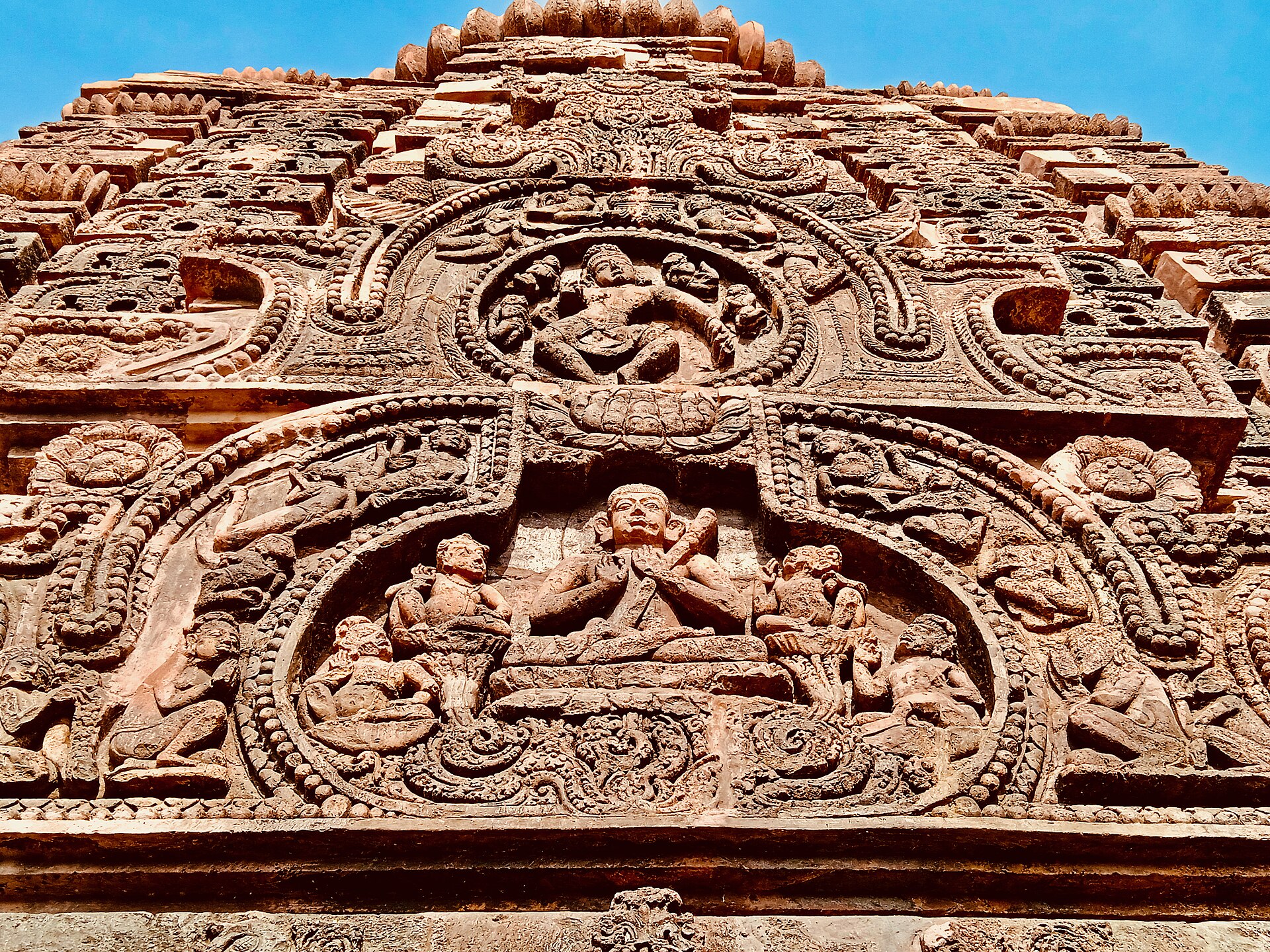 Carved stone temple architecture at the Mukhalingeswara temple complex in Andhra Pradesh.