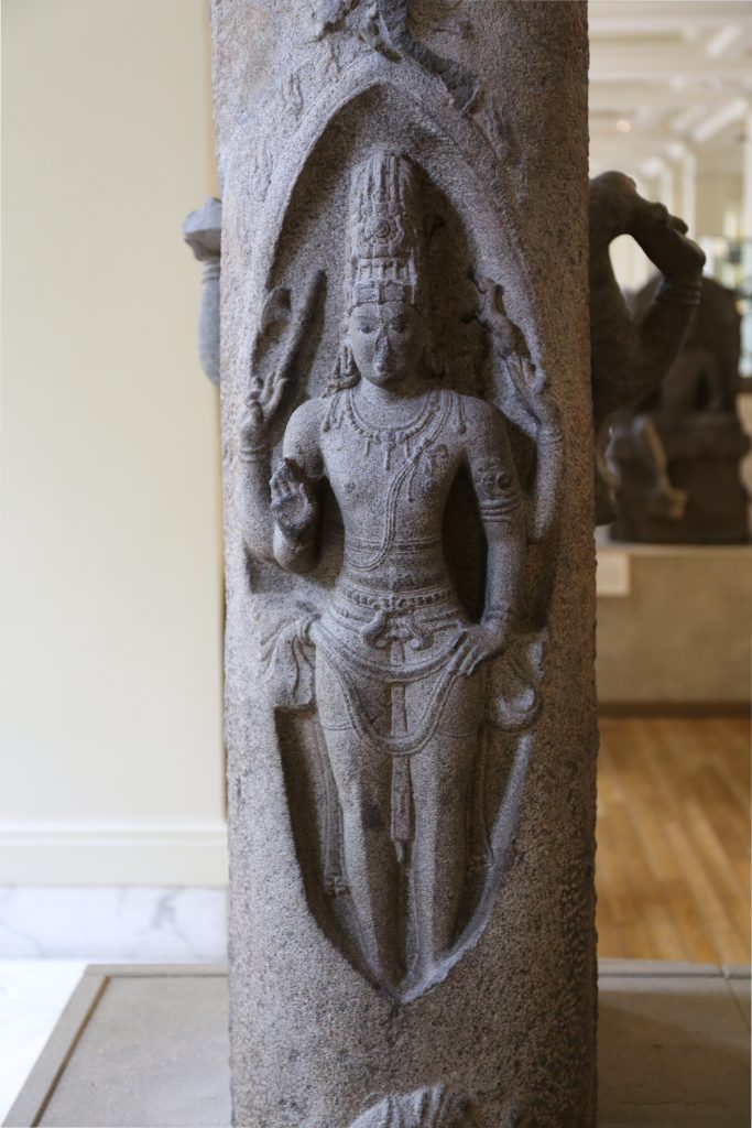 Stone sculpture of Shiva appearing as Lingodbhava within a pillar of light.