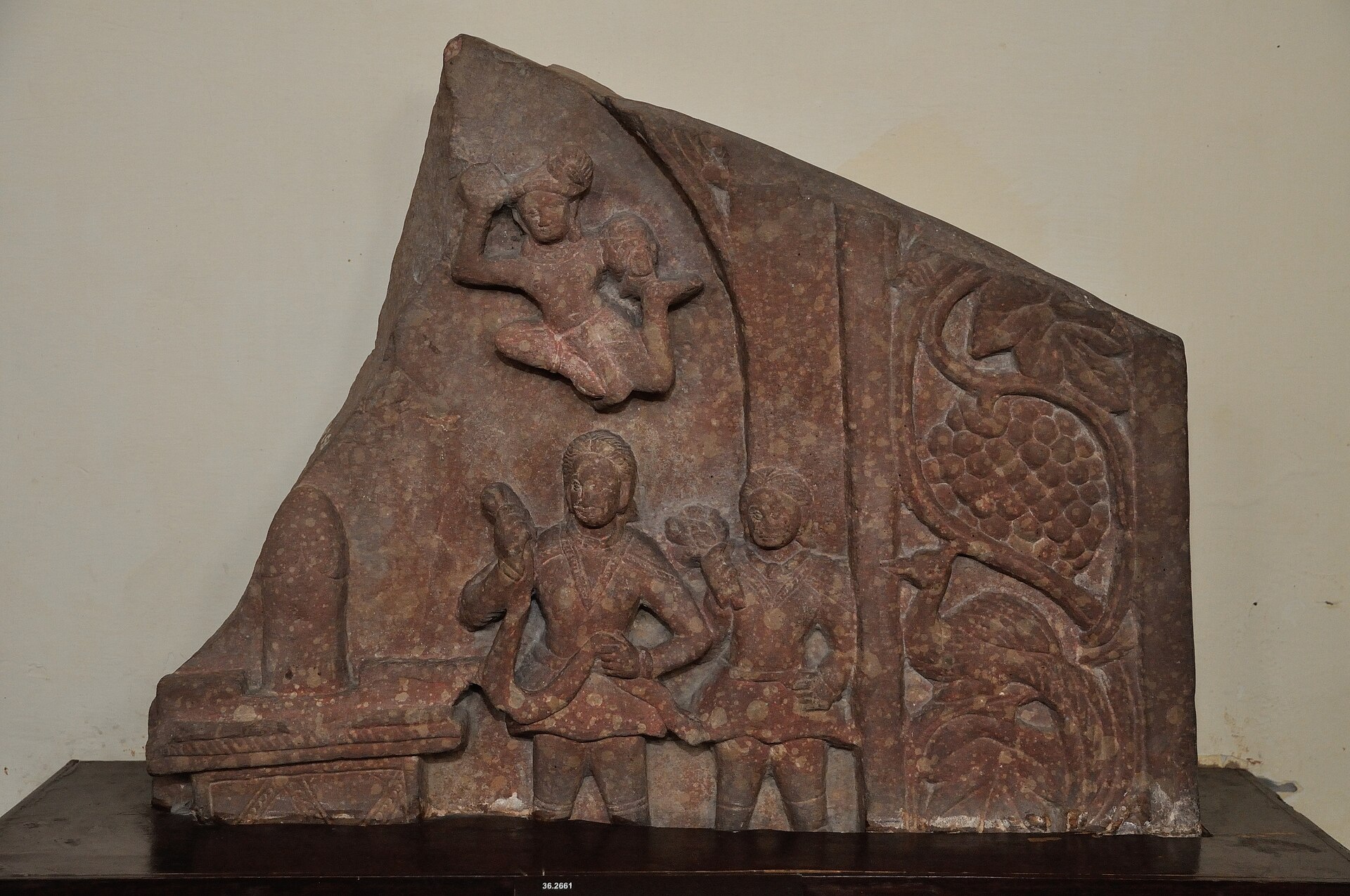 Kushan-period stone relief showing devotees worshipping a Shiva linga.