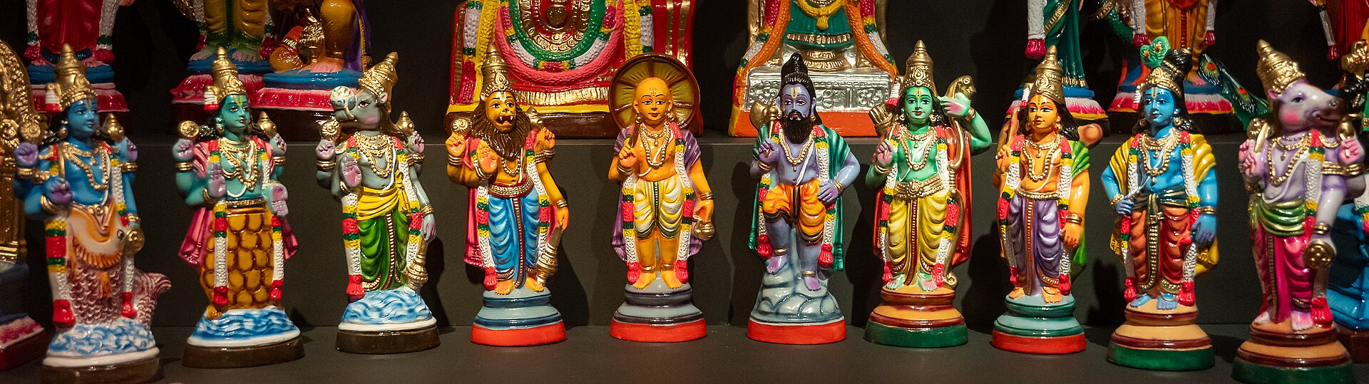 Traditional painted figurines representing Vishnu’s Dashavatara, including Matsya.