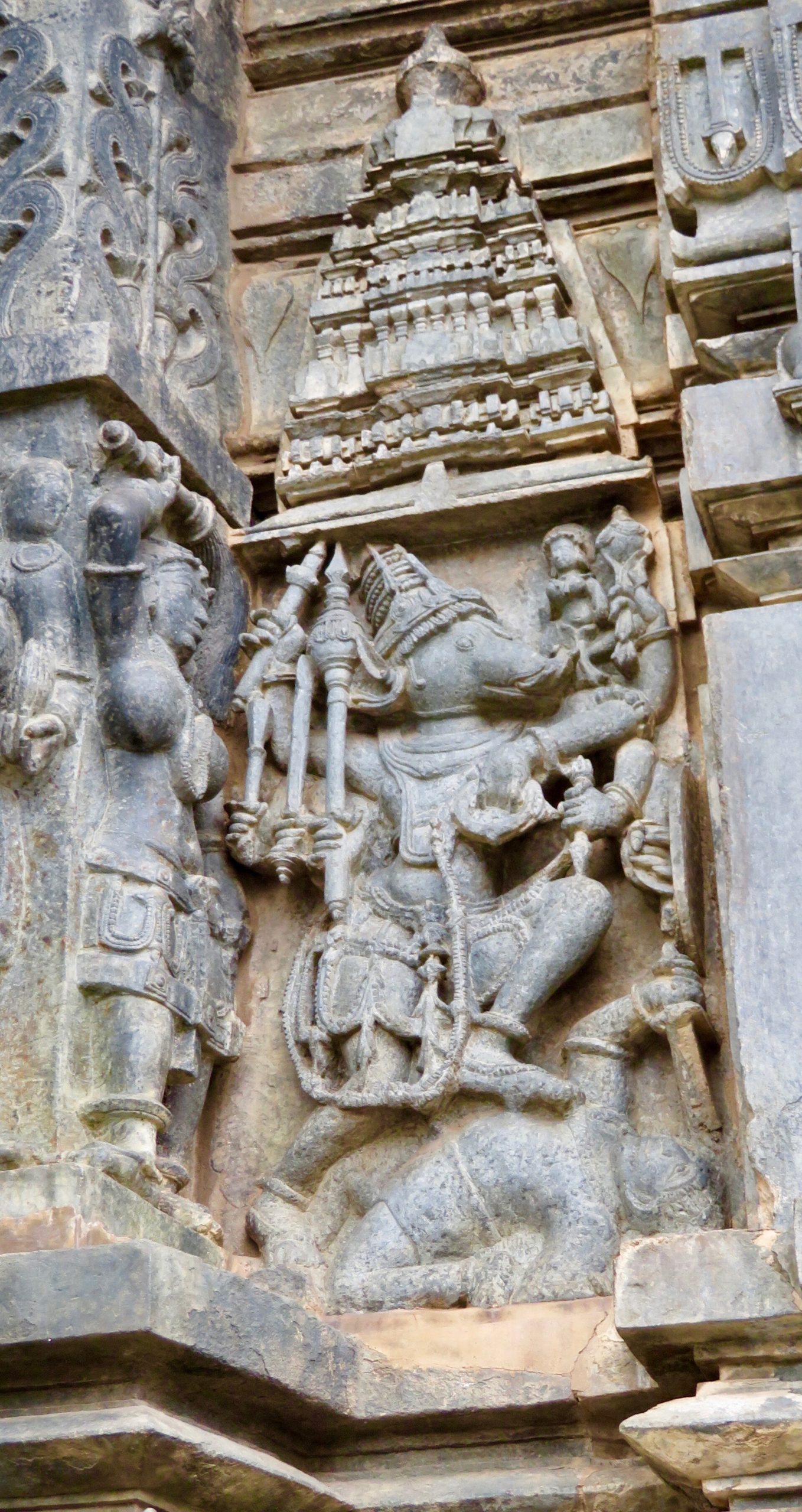 Twelfth-century temple sculpture of boar-headed Varaha with Bhudevi.
