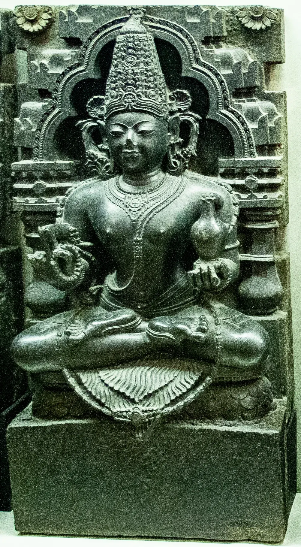 Stone Navagraha relief figure identified by the source as probably Budha, associated with Mercury.