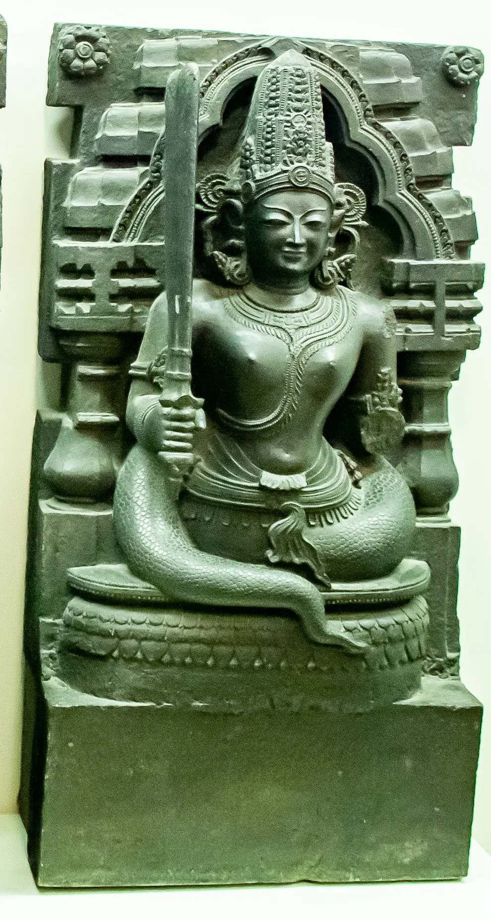 Stone Navagraha relief of Ketu with a serpent-like lower body.