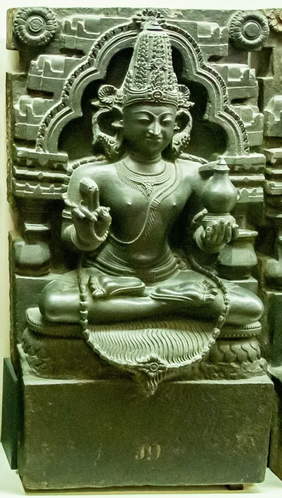 Stone Navagraha relief figure identified by the source as probably Mangala, associated with Mars.