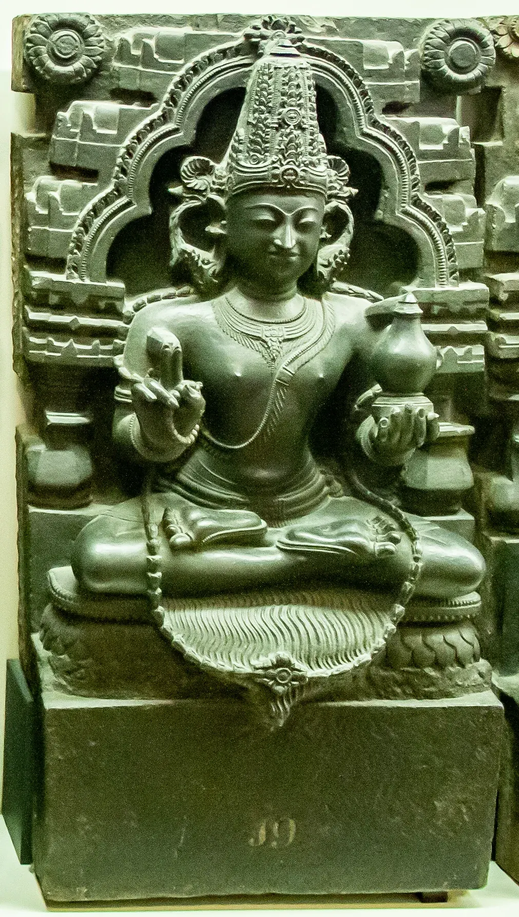 Stone Navagraha relief figure identified by the source as probably Mangala, associated with Mars.