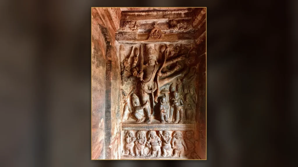 Stone relief of Vishnu as Trivikrama, associated with the Vamana narrative.